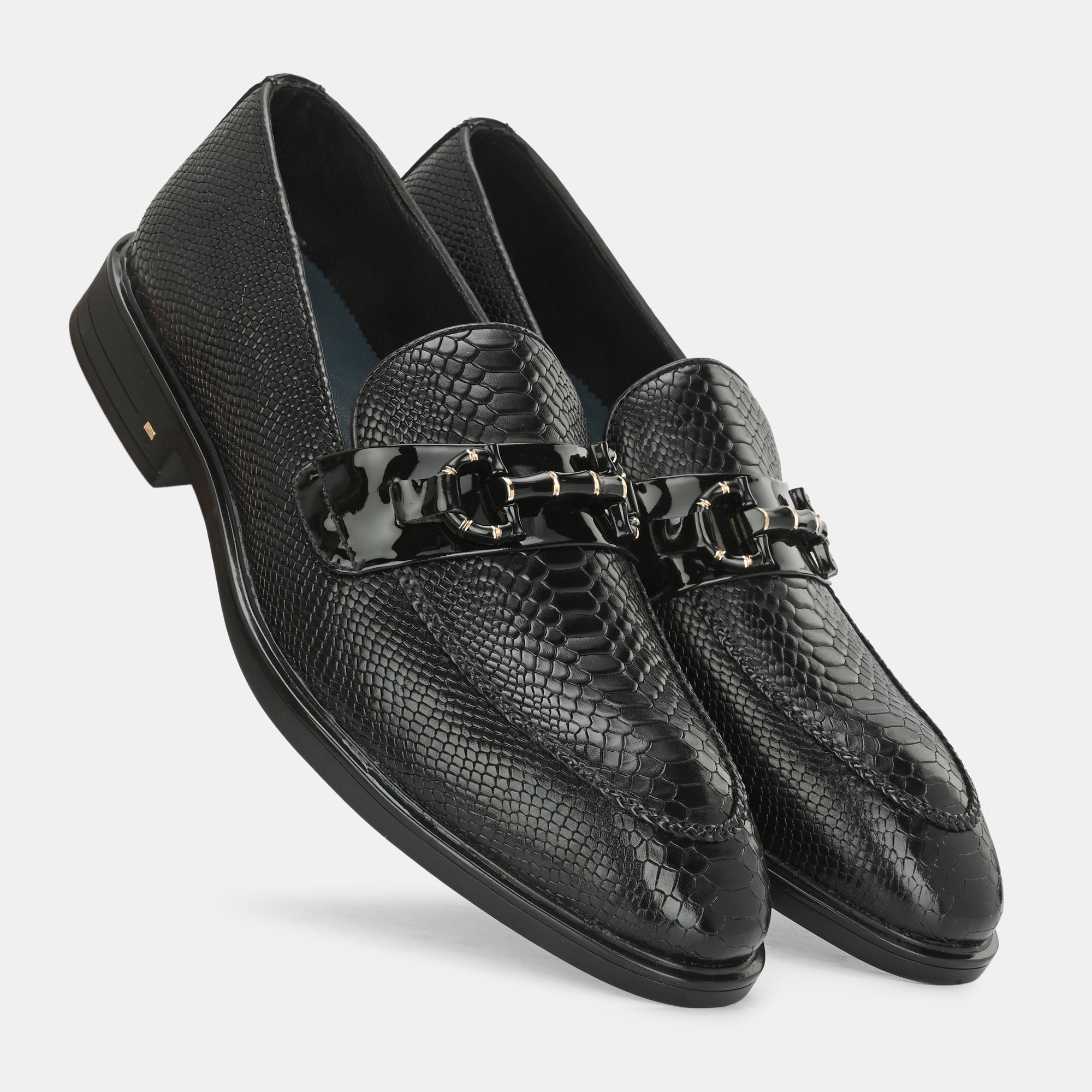 Black Textured Buckled Loafers by Lafattio