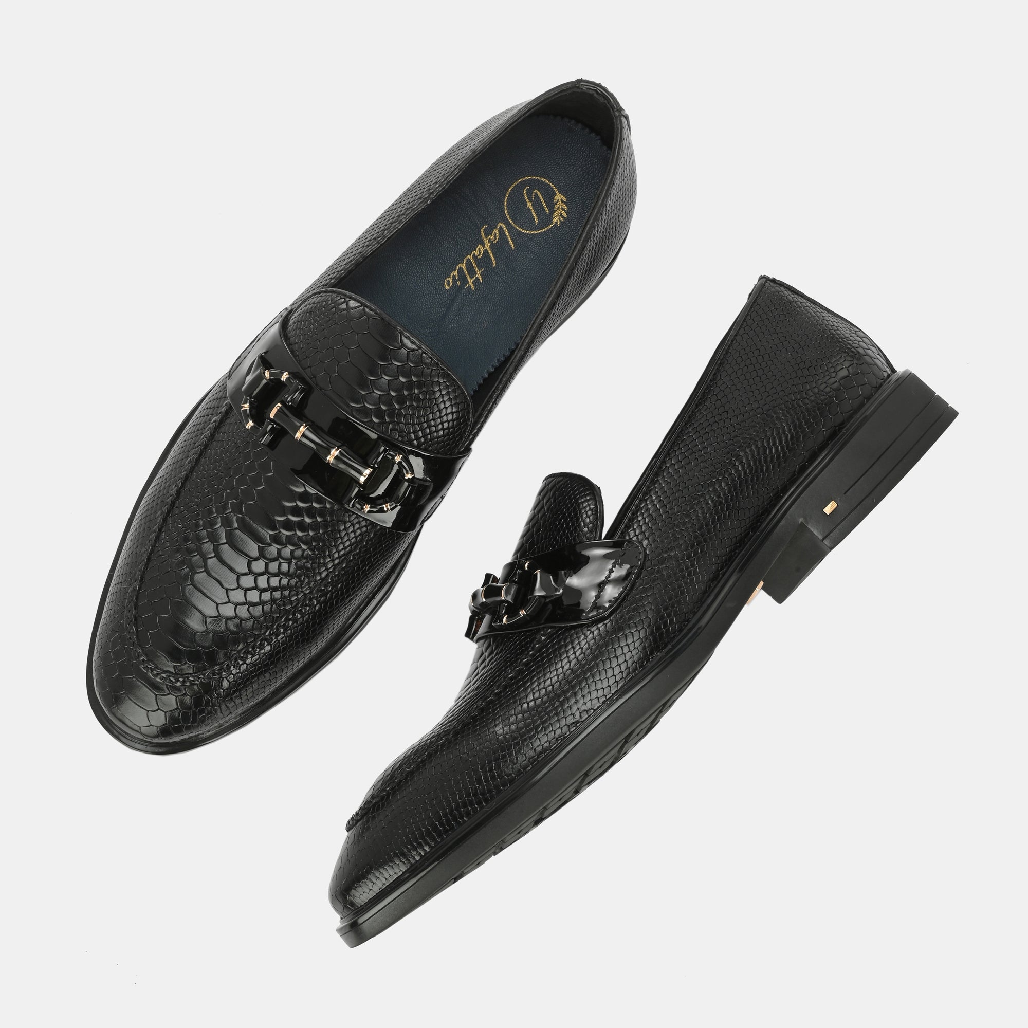 Black Textured Buckled Loafers by Lafattio